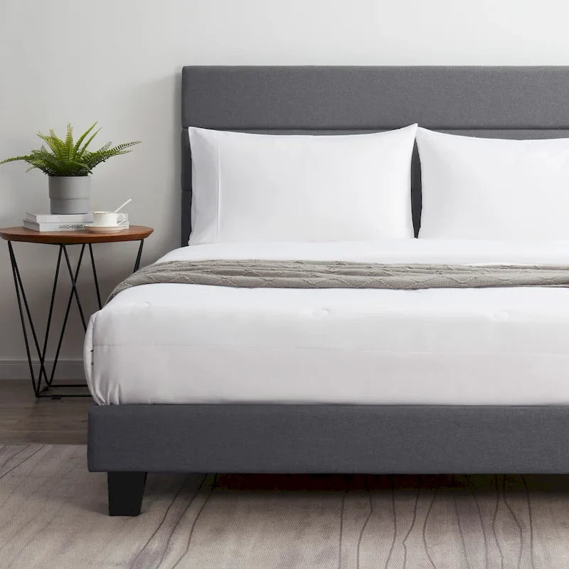 Cama de plataforma tapizada con canales horizontales