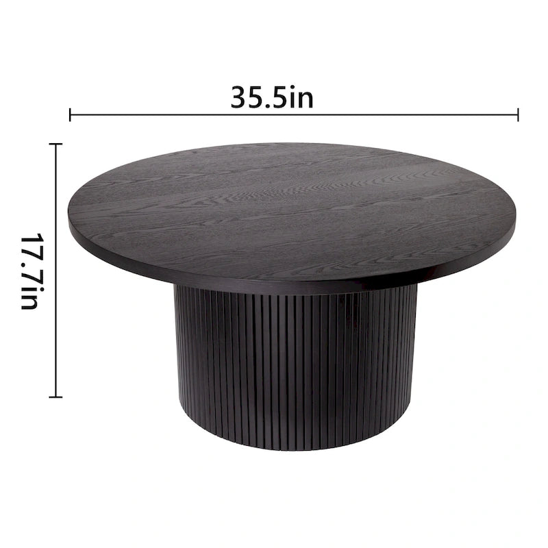 Table basse ronde à piètement cannelé