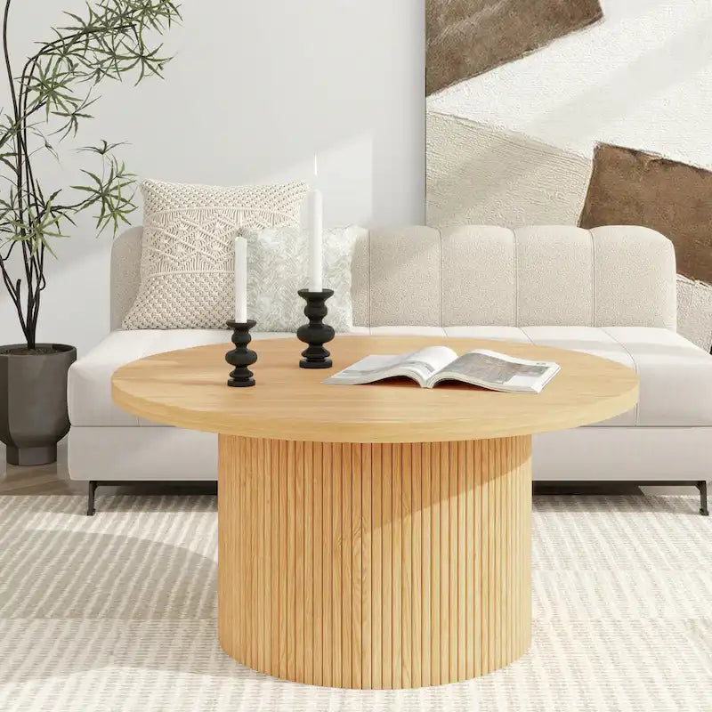 Table basse ronde à piètement cannelé