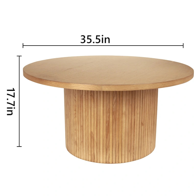 Table basse ronde à piètement cannelé