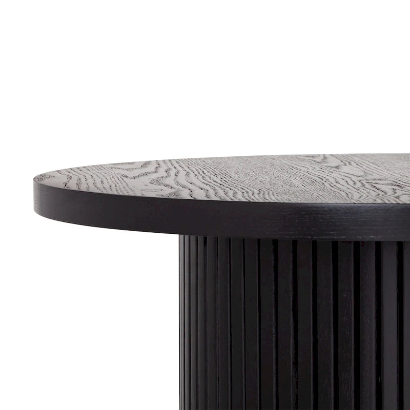 Table basse ronde à piètement cannelé