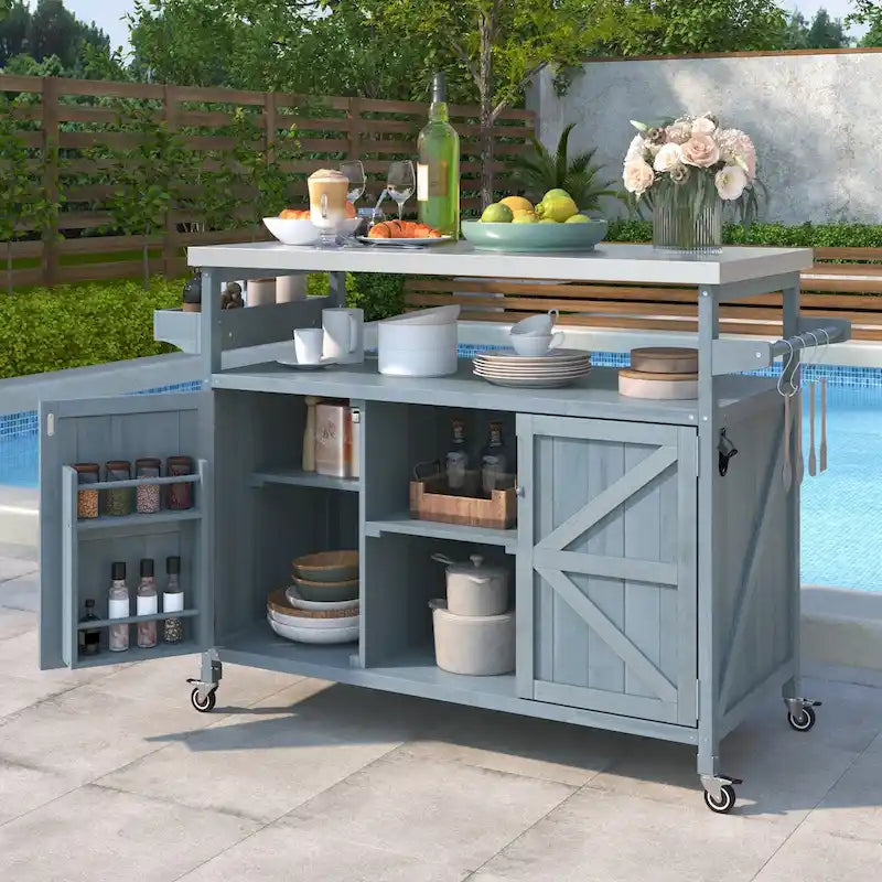 Îlot de cuisine d’extérieur avec chariot à roulettes et plateau en acier inoxydable